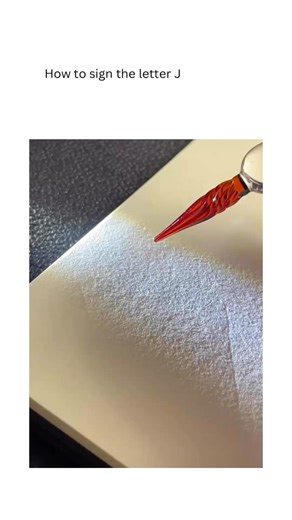 Calligraphy Videos on Instagram: "J is a simple line that discovers its grace at the very end. It begins with a slender vertical stroke—quiet, steady, almost reserved. As it reaches the baseline, it softens into a gentle curve that sweeps forward, like a gesture of invitation or a smile drawn in ink. That single curve transforms J from a straight descent into a letter full of motion and warmth. Its sound carries that softness—journey, joy, just, gentle. A light beginning that lands with ease. On