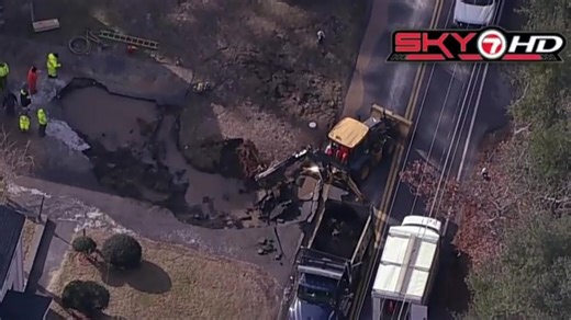 Major water main break in East Bridgewater sends water pouring down street, damages home