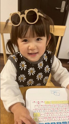 A three-year-old child trying hard to speak incomplete words