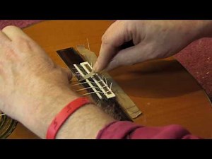 Saddle intonation for classical guitar