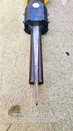 Breaking Rocks: How a Hydraulic Stone Hammer Works.Its Powerful Demolition Tool