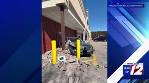 Car crashes through former storefront in Middletown