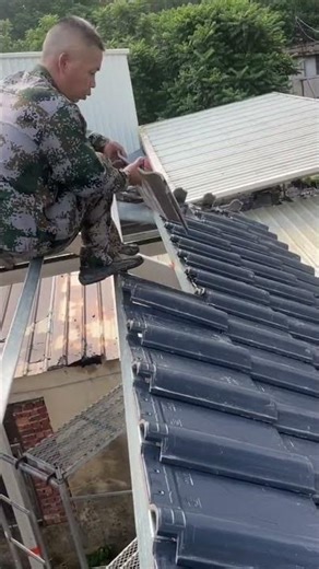 The process of installing roof tiles on a building roof using a light steel frame #construction