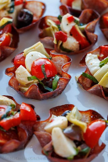 These bite-sized Salami Cups are a fun and creative appetizer idea, perfect for your next party. RECIPE: https://natashaskitchen.com/salami-cups/ #appetizers #salamicups #charcuterie #salami | NatashasKitchen.com