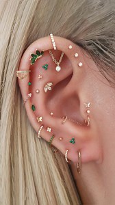 Cute Multiple Ear Piercing Curation Ideas with Green Gold Cartilage Earrings Impuria Jewelry 💚✨ . . . . . #earpiercings #earrings #piercings #earringsofinstagram #earringstyle #curatedear #earringshop #earringaddict #earringswag #earringstagram #cartilagepiercing #traguspiercing #helixpiercing #jewelry #piercinggirl #daithpiercing #conchpiercing #rookpiercing #earcuration #cartilagepiercings #earstack #earstyle #earstylist #newpiercing #earpiercing #flatpiercing #snugpiercing #lobepiercing #for