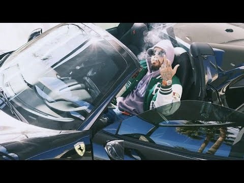 Inside Larry June's Luxury Car Fleet | A Look at His Exquisite Collection
