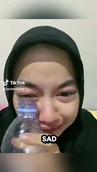 Girl Crying & Filling Bottles with Tears 2024