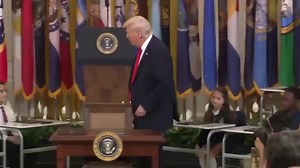 Trump set up a fake classroom to sign his executive order to begin closing the Department of Education. The staged students held up fake executive orders at the end. | John Smith Marketing