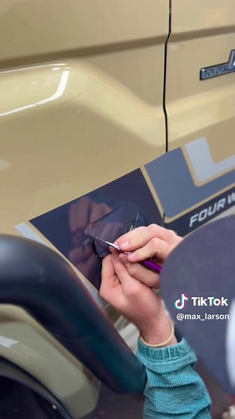 @Oscar absolutely killing the install of these @TougeNation decals #fyp #troopy #4x4 @BushWrapz