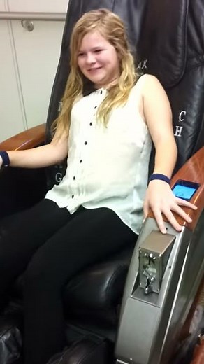 Alana on the massage chair!