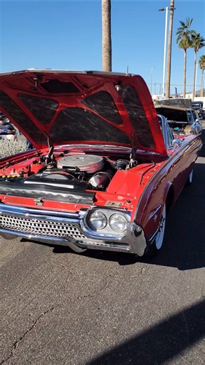 classy vintage Ford thunderbird convertible at classic car meet