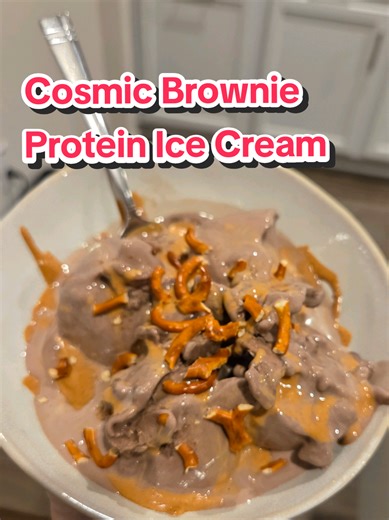 Cosmic Brownie Protein Ice Cream for under 300 calories 🤯 First, if you don't have a @Ninja Kitchen Creami here's your sign to get one ASAP Ingredients & Instructions 1️⃣ In your Ninja Creami pint container mix 8oz Unsweetened Vanilla Almond Milk & 1 scoop @RYSE Supplements Cosmic Brownie Protein powder (click the link below and get yours before the price goes back up) and freeze overnight. 2️⃣ ... the next day... pop your container onto the Ninja Creami base and blend once, I like to add a lit