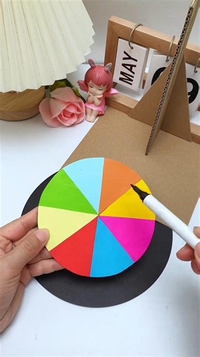 Make a simple and fun spinning wheel , perfect for playing with kids on Children's Day!