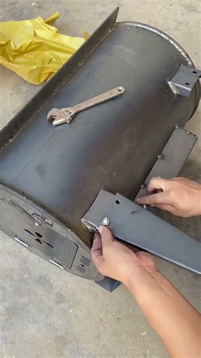 This combined heating and cooking stove can burn firewood or coal Rural Heating Gadget.