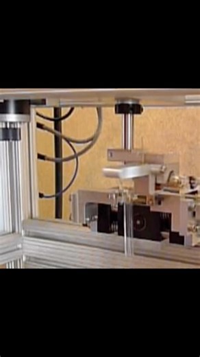 PLC semi-auto carbide cutter for electrodes. Once unit is homed, it is loaded with an electrode and two opposing carbide cutters move in to score the glass as it spins. It is then snapped off by hand. Full video in comments. https://www.cathodelightingsystems.com/ | Michael Grossman