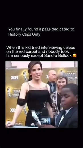 History Clips Only | A young boy stands on a red carpet, confidently holding a microphone while famous celebrities pass by, barely acknowledging him. Cameras... | Instagram