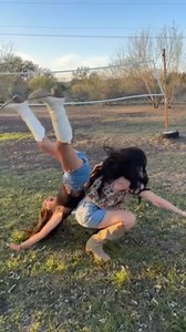 Before leaving for a concert these two best friends decided to attempt a viral backflip. As the second girl sat on the first one's shoulder and tried to flip backward, she ended up losing her balance and falling to the ground. | Jukin Copyright Management