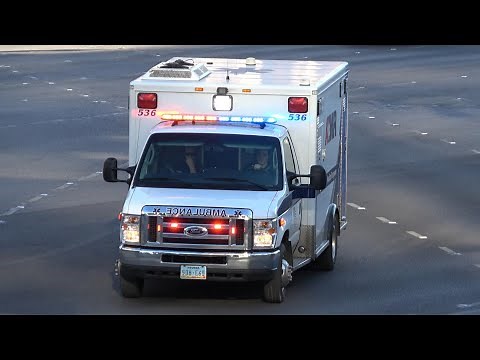 American Medical Response ambulance responding with siren and lights