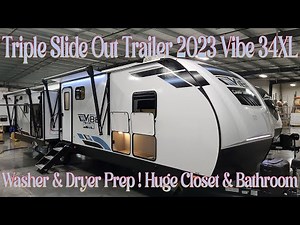 2023 Vibe 34XL Triple Slide Out Travel Trailer by Forestriver RV @ Couchs RV Nation a RV Wholesaler