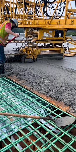 Concrete Leveling Techniques by a Construction Worker