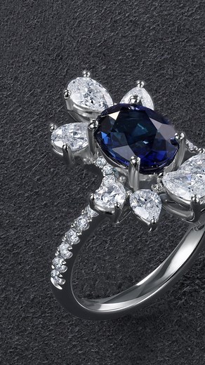 No Elevate your style with this exquisite sapphire and diamond ring, meticulously crafted in lustrous white gold. The captivating deep blue sapphire center is elegantly framed by shimmering pear-shaped diamonds, creating an enchanting floral motif that radiates sophistication and timeless beauty. Perfect for special occasions or as a statement piece, this luxurious ring showcases remarkable craftsmanship and dazzling brilliance. Make heads turn and hearts flutter with every gesture. #SapphireRin