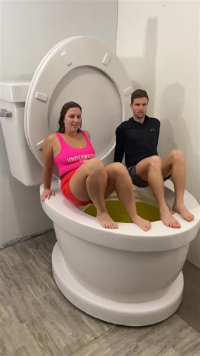 Jumping into Giant Toilet Yellow Swimming Pool with EX BOYFRIEND #shorts | Michelle Kellam