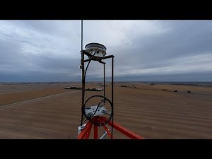 climbing a 300ft cell tower as a storm approaches