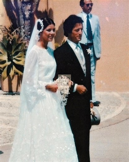 “Princess Caroline of Monaco marries French businessman Philippe Junot in a grand religious ceremony held at Monaco’s Royal Palace in June 1978. Surrounded by European royalty, international dignitaries, and Monaco’s citizens, the event marked a significant moment for the House of Grimaldi. Caroline, the eldest daughter of Prince Rainier III and Princess Grace, wore a romantic Christian Dior gown designed by Marc Bohan. The ceremony, steeped in tradition and elegance, was followed by a lavish re