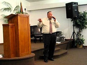 Pastor Escobar preaching the spanish service