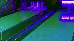 Bowling. View of the bowling alley and the moving ball