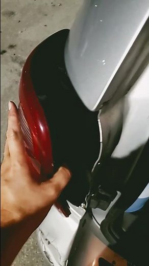 Remove brake light/turn signal bulb. Replace with new bulb. Installation is reverse of removal
