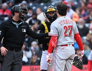 Why did a Pirates pitcher throw at Sal Stewart and what did umps say?