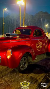 The Alan Pittman/Mike Sword '41 Willys is a beauty under the lights!…. Back Up Girl Heather Peek assists in getting this Hotrod lined up in the groove. 🇺🇸💪🏼🏁 #southeastgassers #race #gasser #retro #racing #race #vintagestyle #america #usa #herewego #headsup #hotrod #coolcars #willys #music #racinglife #friends #family #letsgo | Southeast Gassers Association