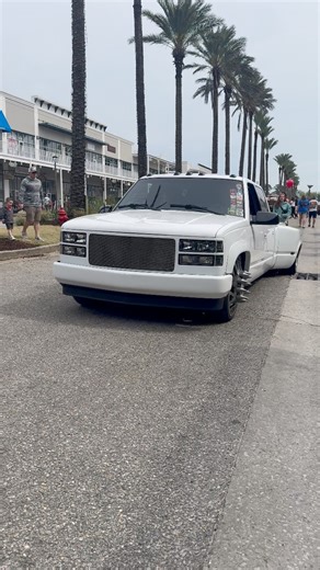 OBS Chevy Dually Rolling Out Of Orange Beach Invasion #sickslammedtrucks #obschevy #baggedtrucks | SICK Slammed Trucks