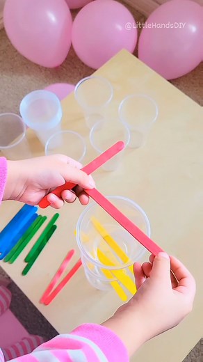 Balance the Cups Activity for Kids This easy to set up activity is great for motor coordination, motor skills, and concentration. Ages 4 and up. #littlehandsdiy #diyforkids #craftsforkids #diy #activitiesforkids #math #learnmath #dominoes #balanceactivity #cupbalance #balancegame | Little Hands DIY