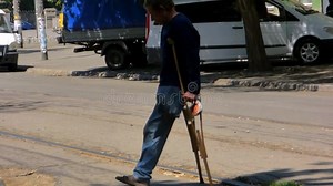 Disabled with One Leg on Crutches Stock Video - Video of move, walk: 60891035