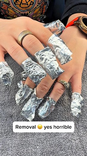 Removal time! 😅 Yes, it sounds horrible — but it’s not painful, and it doesn’t damage the natural nails at all. These gorgeous 5-week-old nails held up beautifully, but it was time for a fresh set 💅✨ #nailremoval #acrylicnails #nailcare #nailtechlife #rockstarnailsandspa | Rockstar Nails & Spa - Nail salon Kansas city MO