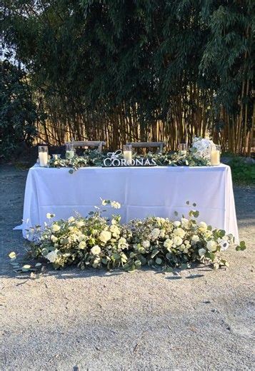 There are many ways to reuse your engagement photos for your wedding. One creative way is having a slideshow showing off your photos at the reception. You can get more creative by adding them to your welcome table, seating chart, or bar signage. Mixing photos of different sizes or printing them on varied textures can make the display feel intentional and visually balanced. It’s a thoughtful way to connect your engagement season to your wedding celebration while adding personality to every corner