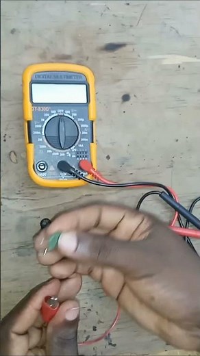 Testing a thermistor with a multimeter.
