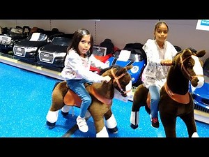 Little Girls Riding Pony Cycle Ride On at Smyths Toy Store | Kids Toys Shopping