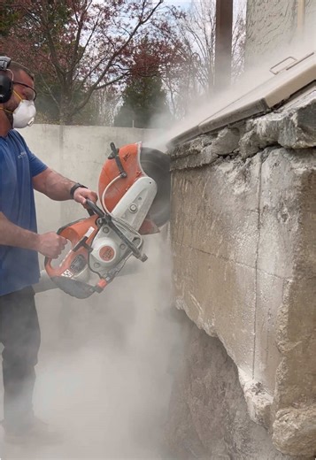 Demolishing Old Basement Stairs for New Addition