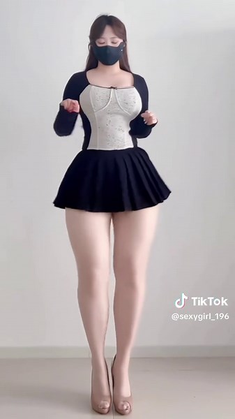 Charming Dance Moves from a Stylish Lady