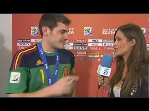 Casillas celebrates with a teary kiss on his girlfriend Sara (true love)