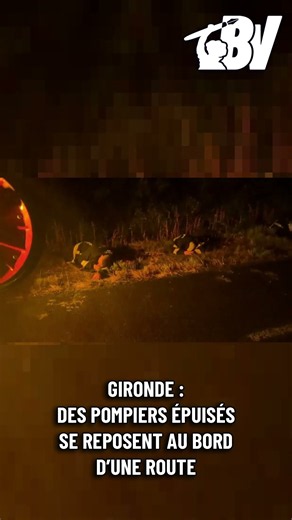 Des pompiers épuisés par la lutte contre les incendies se reposent au bord d'une route | Gironde