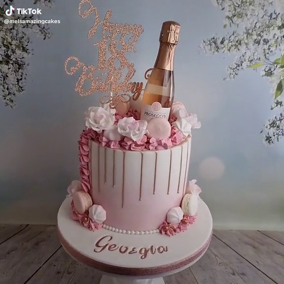 A pretty pink and rose gold 18th Birthday cake for Georgia last week. We discovered the most amazing fondant by @homebakerssupplies, now our go to fondant. It's fabulous to use and tastes fantastic. Macarons. Sugar roses, rose gold drip, piped buttercream, meringues. Sprinkles, a bottle of bubbly and finished with a fabulous topper from @owlandoak_designs . . . #macaroncake #dripcake #pinkcake #celebrationcake #18thbirthday #18thbirthdaycake #melsamazingcakes #rosegoldcake #sugarflowers #sugarro