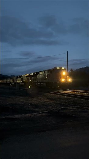 BNSF ES44C4 6881, BNSF ES44AC 5743 and BNSF ES44AC 5799 leading an empty grain train through Easton