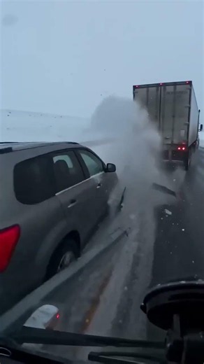 Fishtailing Truck Narrows Miss on Ice Road