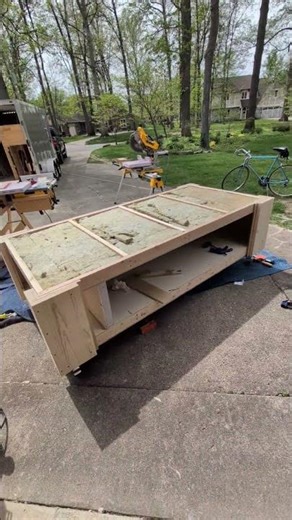Insulated warming box for curing parts and molds under the work bench.