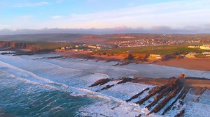Crooklets beach aglow at sunset. :-) Are you dreaming of your next Bude sunset? | The Beach Haven