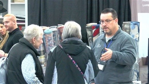 Home improvement specialists meet with homeowners at Pro Home and Garden Show
